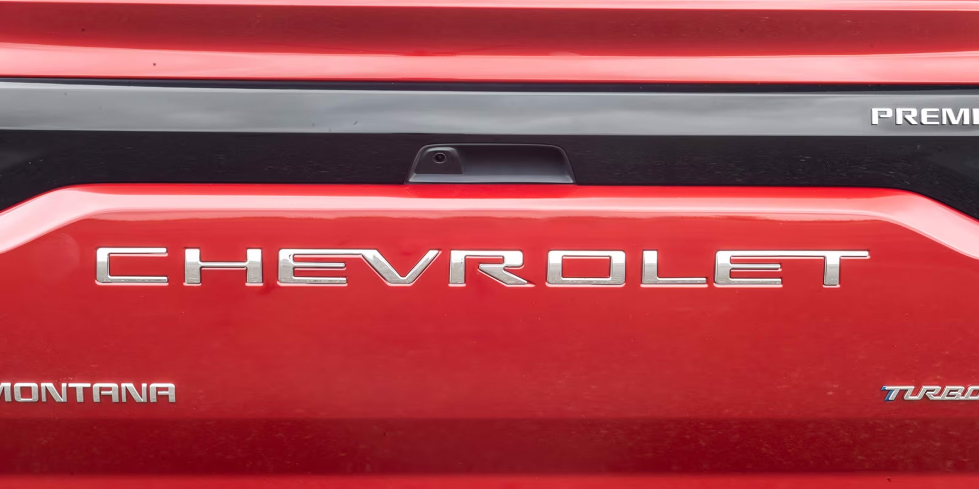 Emblema trasero cromado